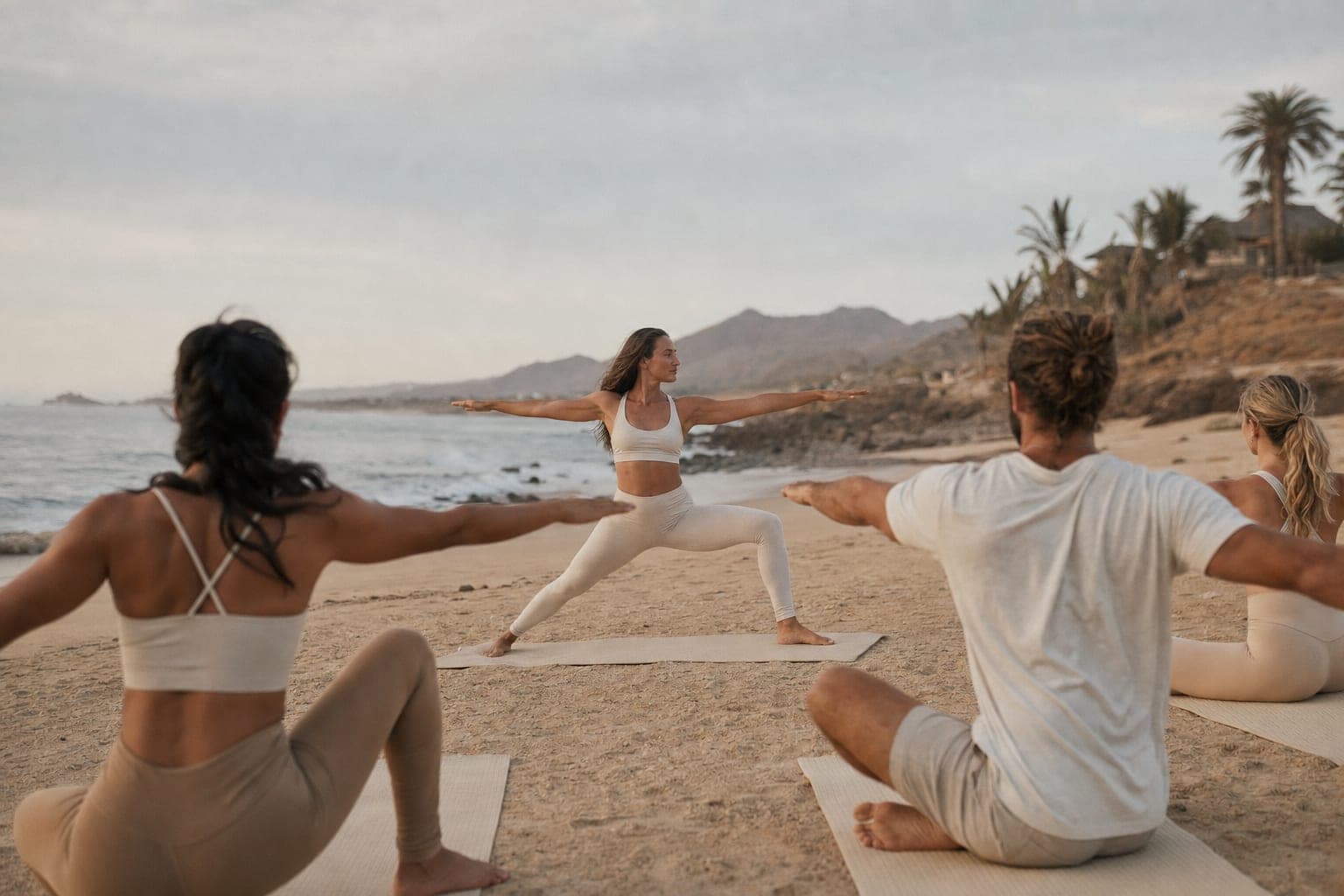 A sunrise beach yoga session on the sand in Baja Sur